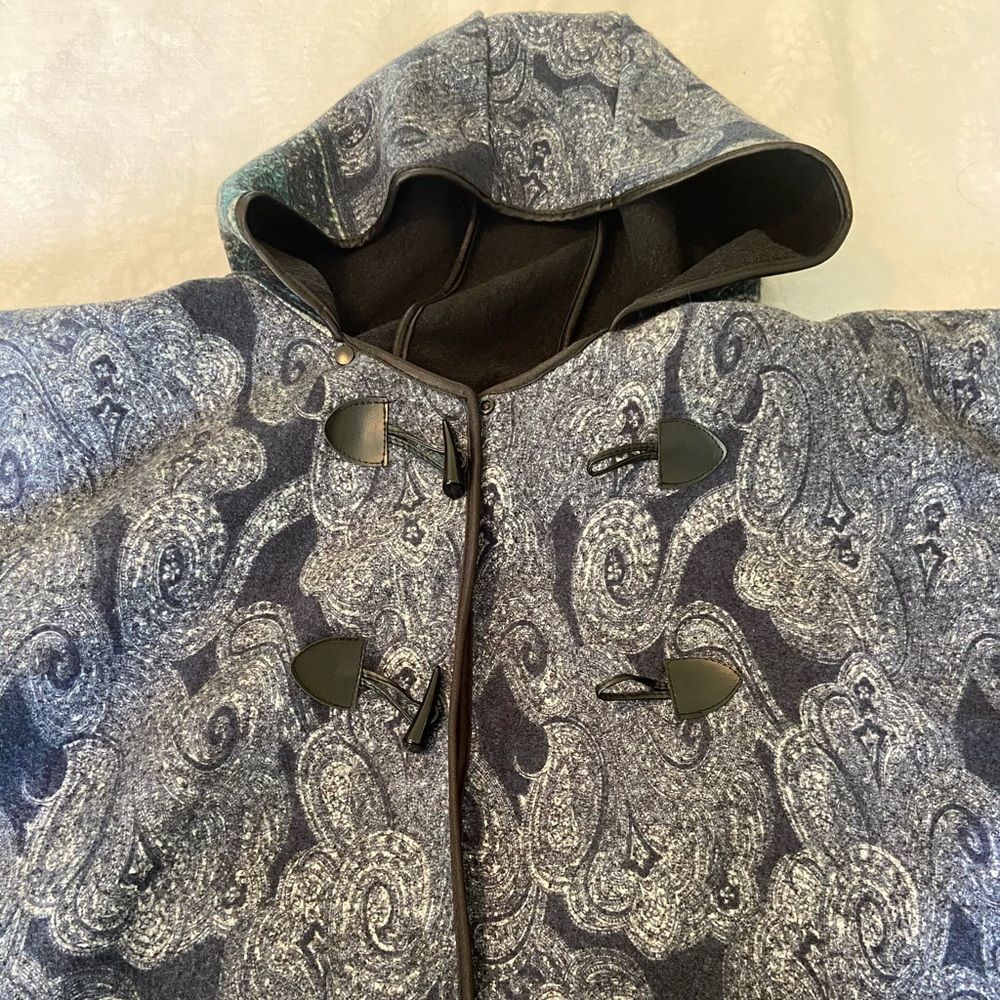 Boutique hooded cape